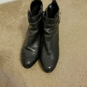 Black heeled boots. Very cute